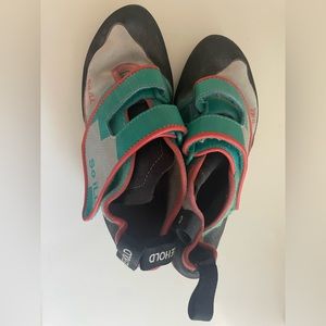 takehold orange and blue climbing shoes